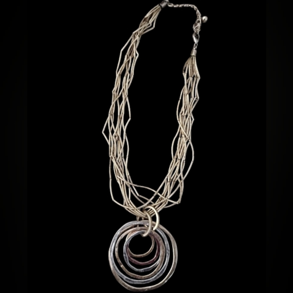 Elegant Multi-Strand Necklace with Silver and Gold Rings